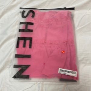 This is a hot pink crop top